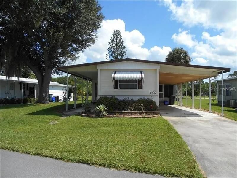 Property Photo:  5792 Holiday Park Boulevard  FL 34287 