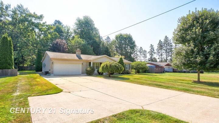 Property Photo:  1838 N Miller Road  MI 48609 