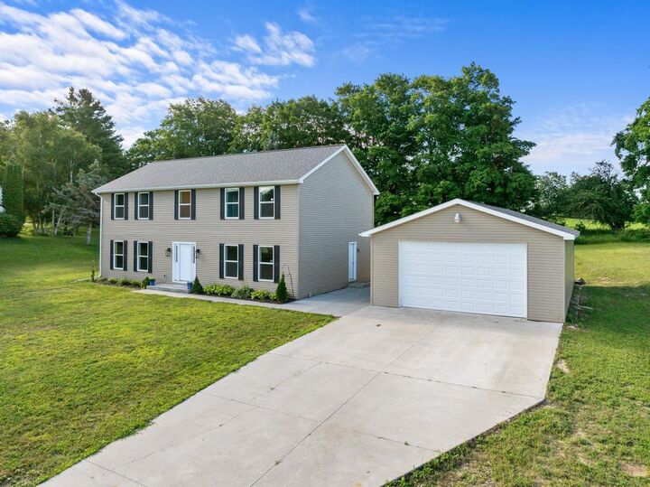 Property Photo:  18180 Hilltop Drive  MI 49720 