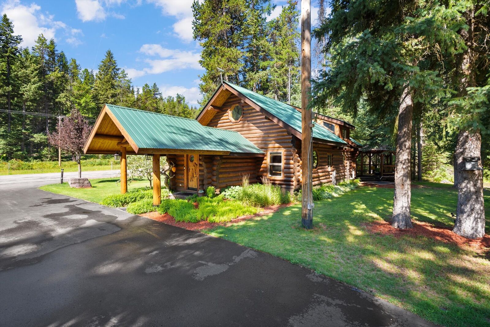 Property Photo:  14440 US Highway 2 E  MT 59916 