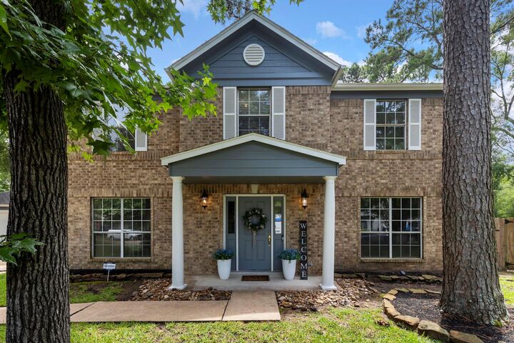Property Photo:  19 Shinyrock Place  TX 77381 