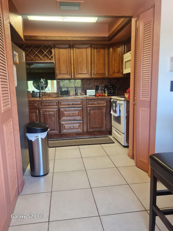 Property Photo:  14797 Cumberland Drive 208  FL 33446 