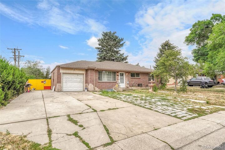 Property Photo:  1493 S Yates Street  CO 80219 