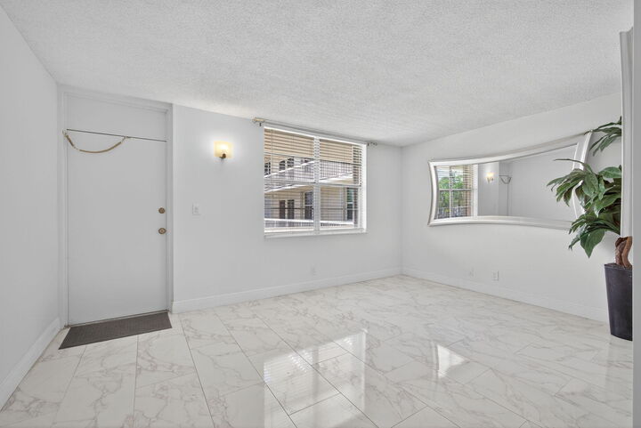 Property Photo:  1131 SE 4th Street 206  FL 33435 