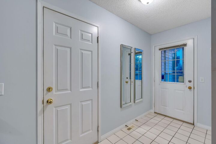 Property Photo: 43 Kingsland Villas SW AB T2V 5J9