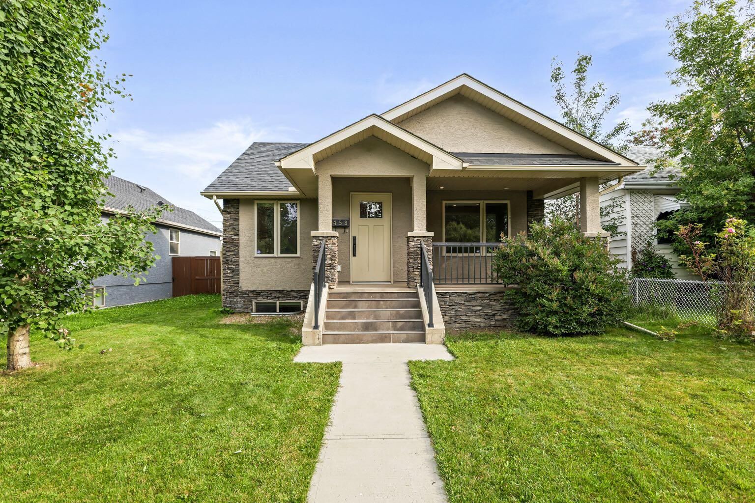 Property Photo: 458 19 Avenue NW AB T2M 0Y4