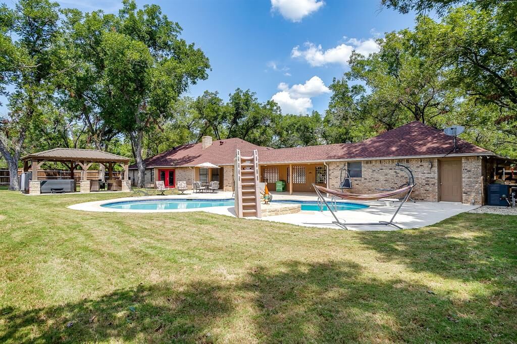 Photo de la propriété:  7303 Ravenswood Road  TX 76049