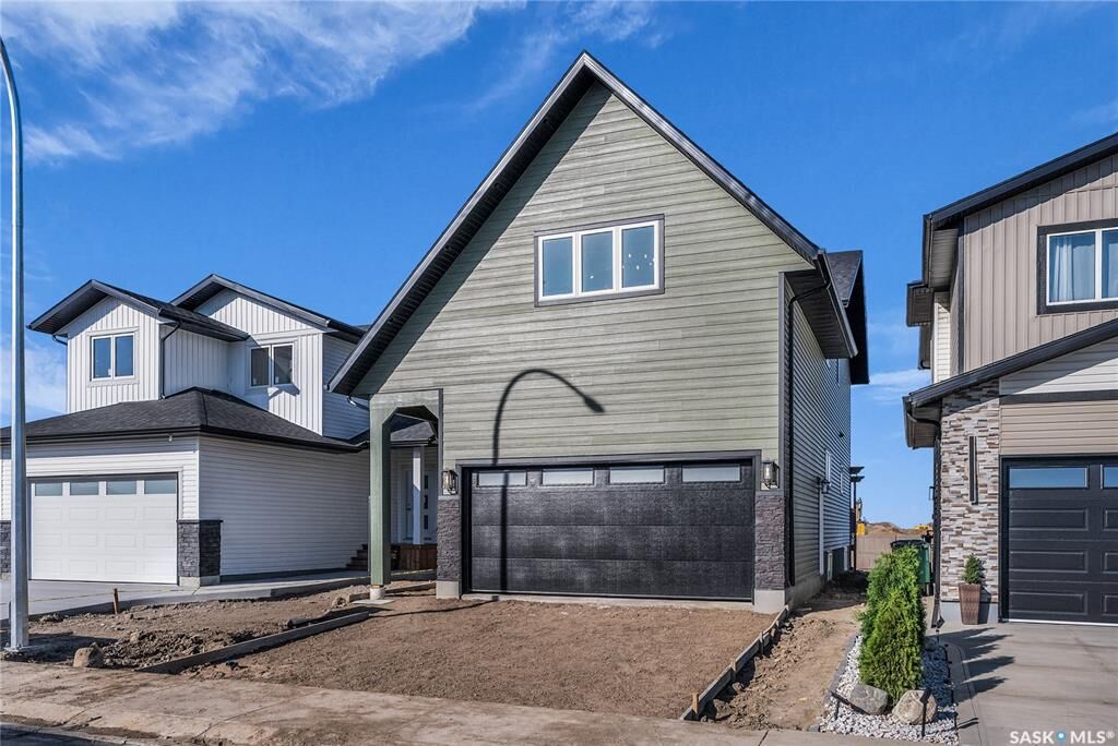 Property Photo: 307 Sharma Crescent SK S7W 1J1