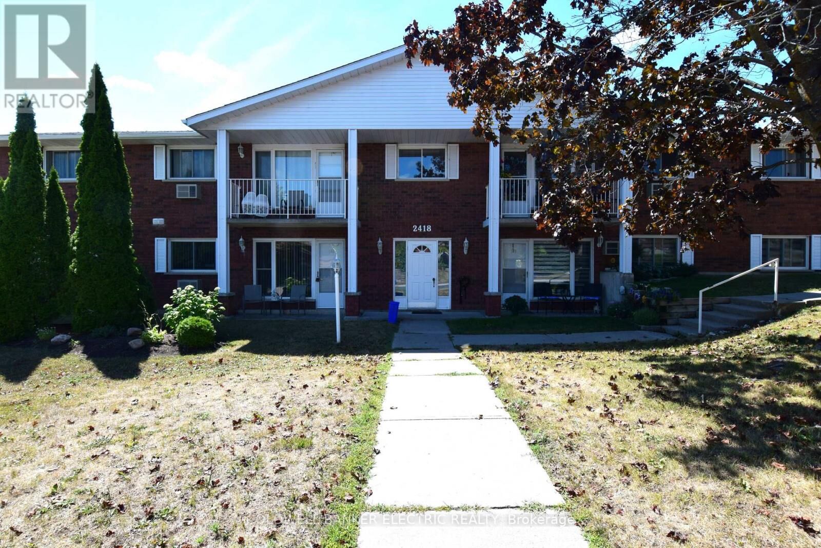 Property Photo: 2418 Mountland Drive 104 ON K9K 2E2