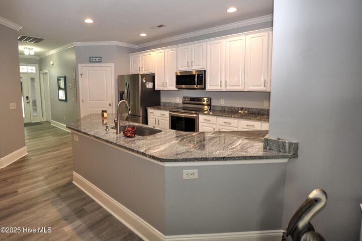 Property Photo:  7195 Bonaventure Street SW 403  NC 28469 