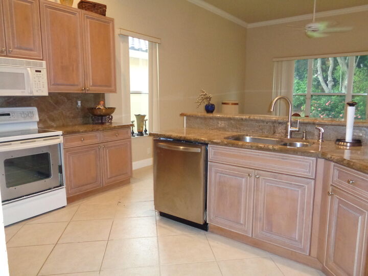 Property Photo: 8957 Torcello Way FL 33472