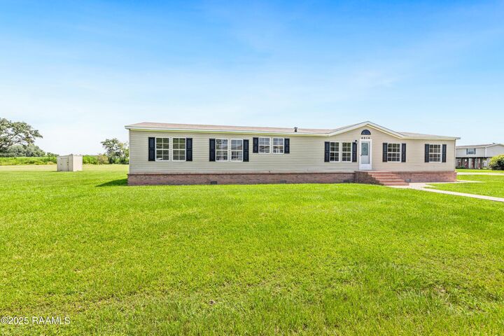 Property Photo:  4014 Rue Martine  LA 70560 