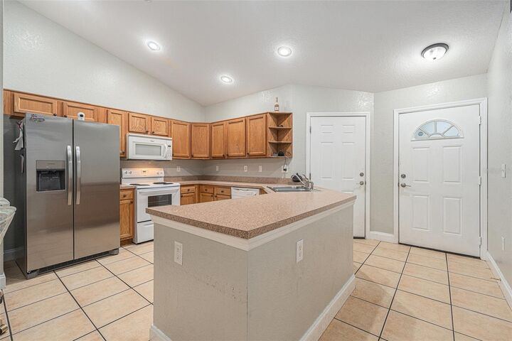 Property Photo:  10321 Hemlock Street  FL 34608 