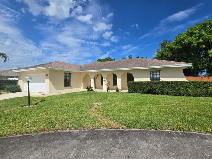 Property Photo: 6504 Heather Way FL 33406