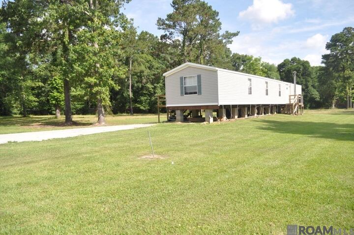Property Photo:  44036 Loop Rd  LA 70769 