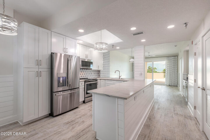 Property Photo: 104 Surfview Drive 2106 FL 32137