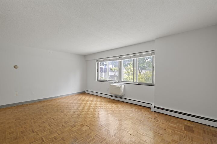 Property Photo:  1025 Hancock St 1F  MA 02169 