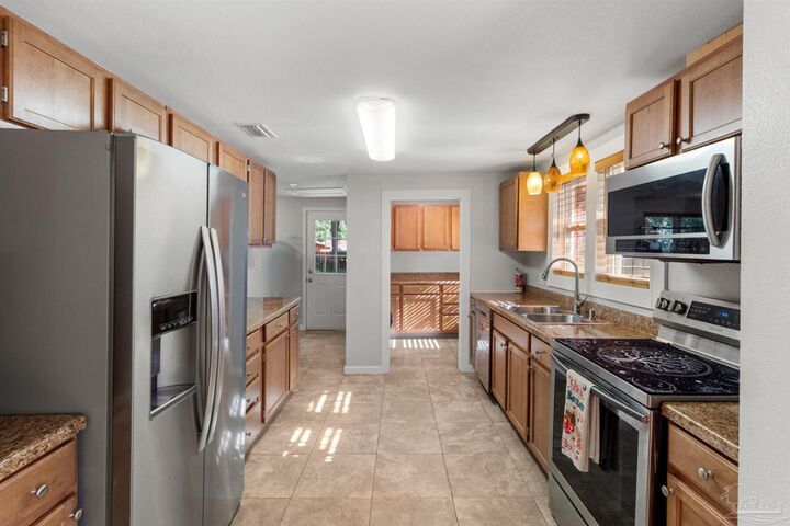 Property Photo: 6608 Magnolia St FL 32570