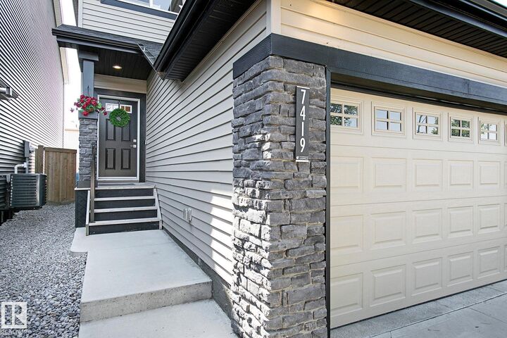 Property Photo: 7419 Creighton Place SW AB T6W 3Z4
