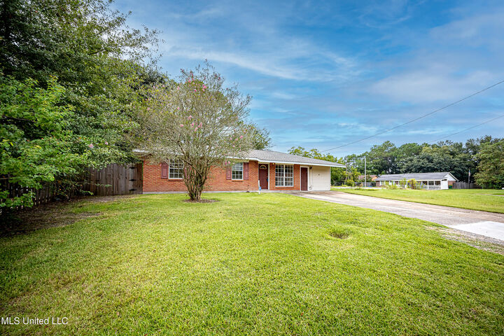 Property Photo: 7646 Madison Drive MS 39532