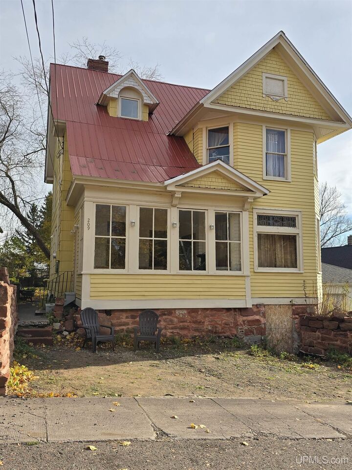 Property Photo: 209 Montezuma Avenue MI 49930