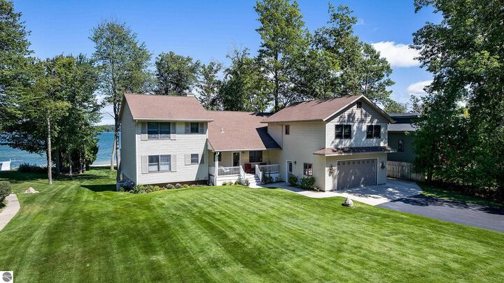 Property Photo:  4115 Birch Drive  MI 49640 