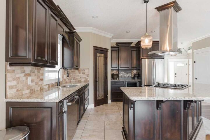 Property Photo: 689 Heritage Drive AB T9K 2X2