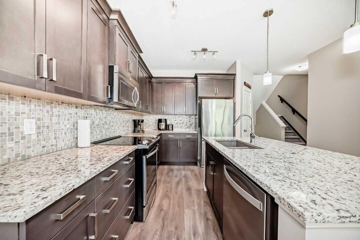 Property Photo: 219 Sunset Point AB T4C 0L2
