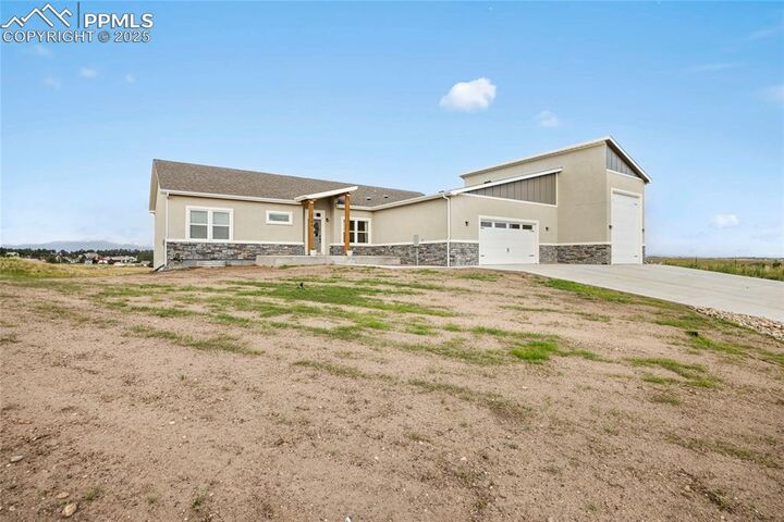 Property Photo: 7154 Marshbern Court CO 80908