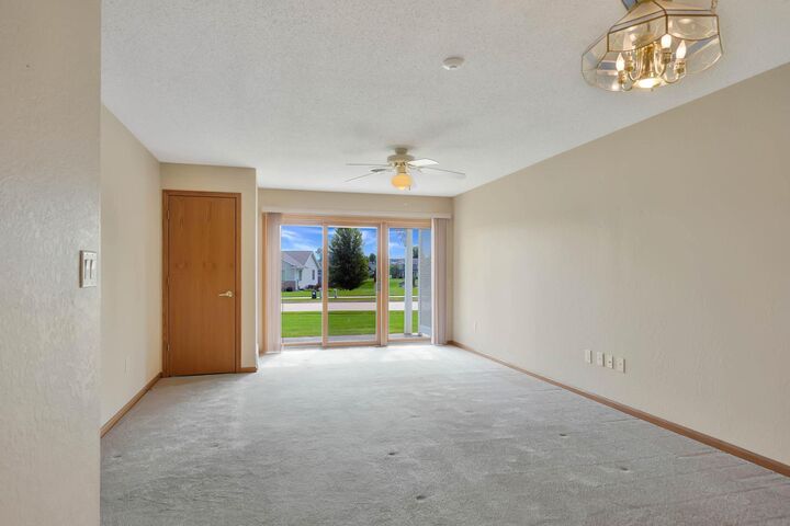 Property Photo:  108 SW 16th Avenue 318  IA 50677 