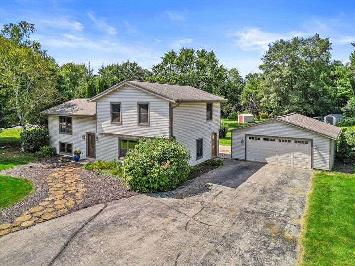 Property Photo:  W334s8031 Tolbert Ln  WI 53149 