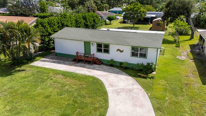 Property Photo:  1881 SE Manth Lane  FL 34983 