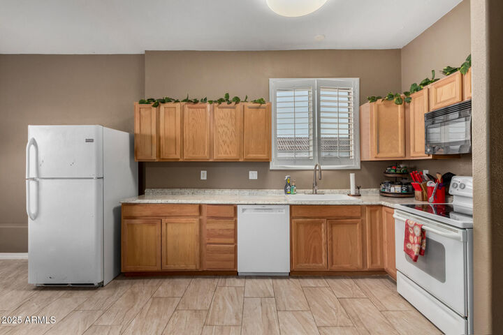 Property Photo: 6413 N 171st Lane AZ 85355