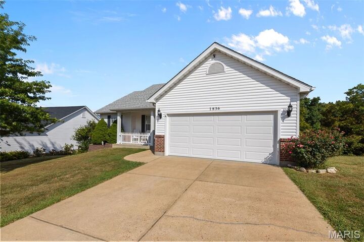 Property Photo:  1836 Championship Lane  MO 63028