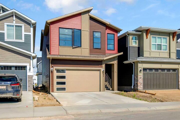 Property Photo: 154 Silver Spruce Grove SW AB T2X 5M2