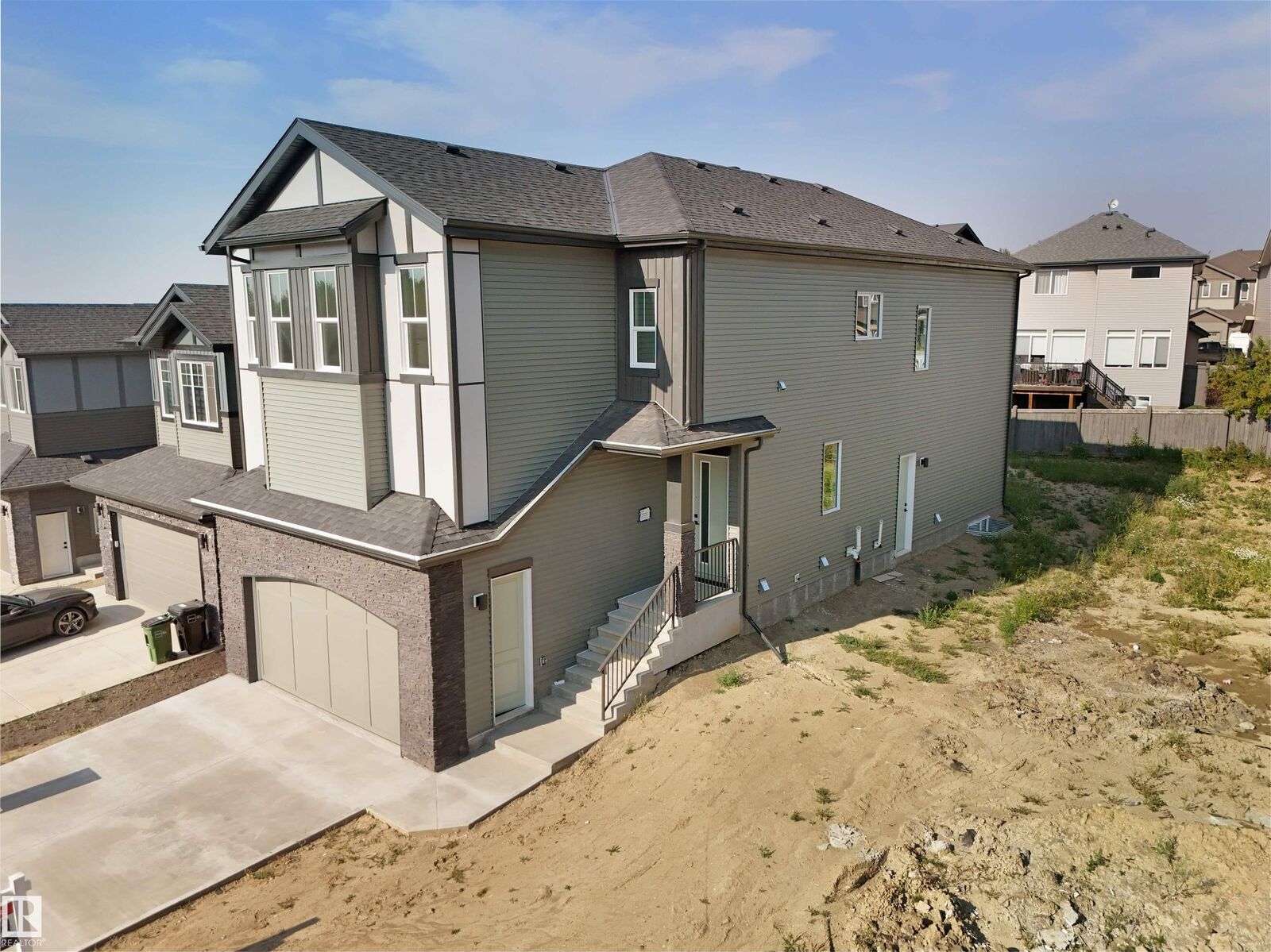 Property Photo: 1142 Gyrfalcon Crescent NW AB T5S 0S5