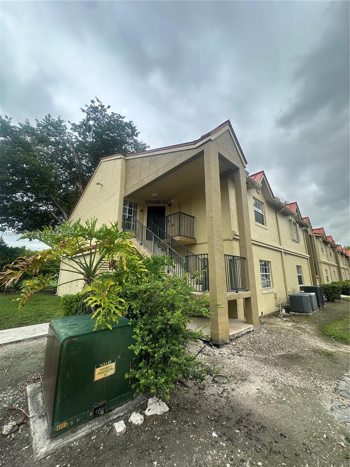 Property Photo:  18318 NW 68th Ave B  FL 33015 