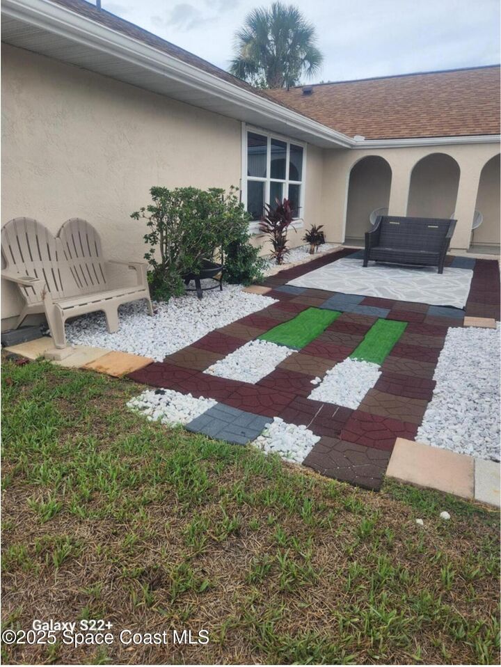 Property Photo: 1303 Cherry Hills Road NE FL 32905