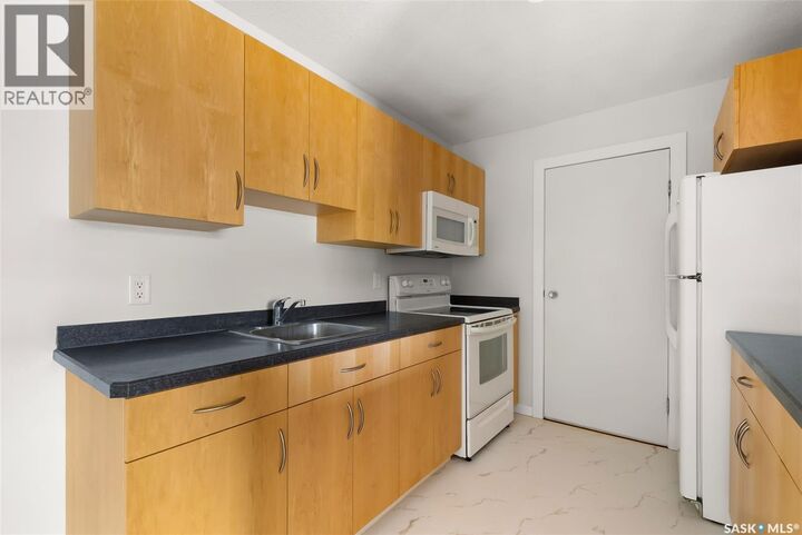 Property Photo:  203 2511 Neff Road  SK S4V 1C1 
