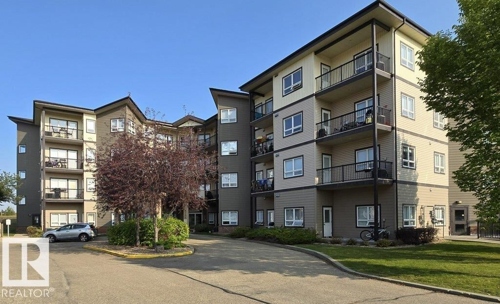 Property Photo: 8702 Southfort Drive 203 AB T8L 4R6