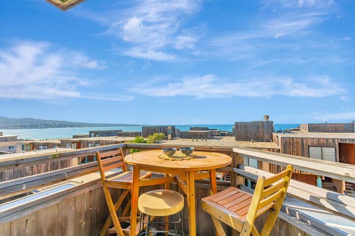 Property Photo:  125 Surf Way 433  CA 93940 