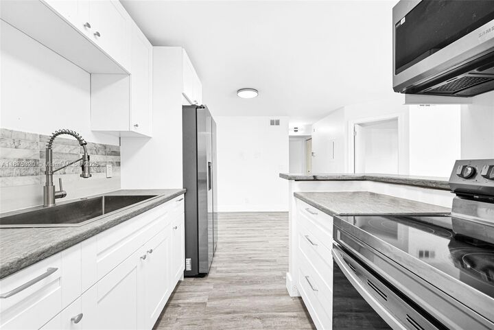 Property Photo:  545 Trace Cir 101  FL 33441 