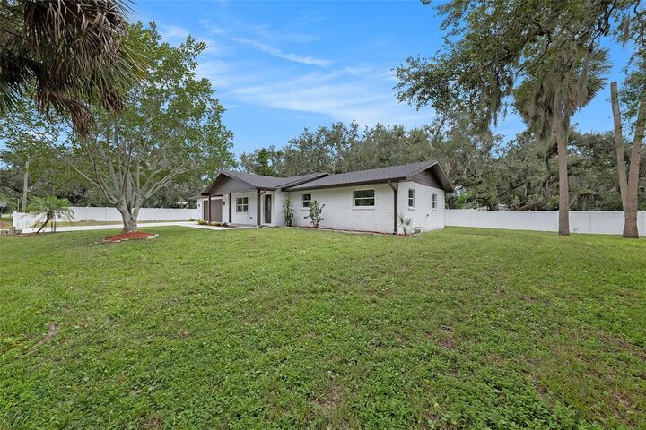 Property Photo:  6103 Palm Avenue  FL 33534 
