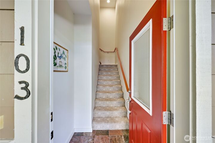 Property Photo:  7761  Beacon Place NE 103  WA 98311 