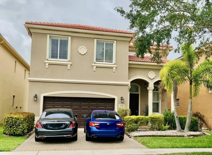 Property Photo:  532 Gazetta Way  FL 33413 
