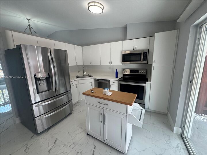 Property Photo:  7684 NW 179th St  FL 33015 