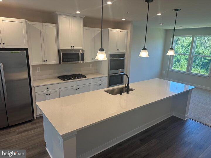 Property Photo:  228 Matisse Place 1012B  MD 20716 