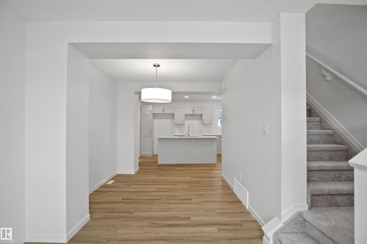 Property Photo:  2 1209 Keswick Drive SW  AB T6W 4J5 