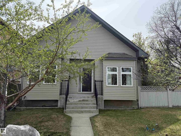 Property Photo:  10651 68 Ave And 6711 107 Street Avenue NW  AB T6H 2B3 