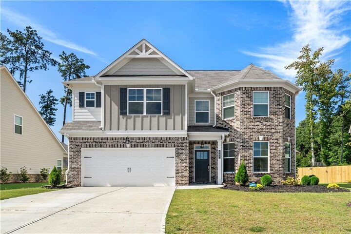 Property Photo:  662 Eagles Nest Circle  GA 30011 